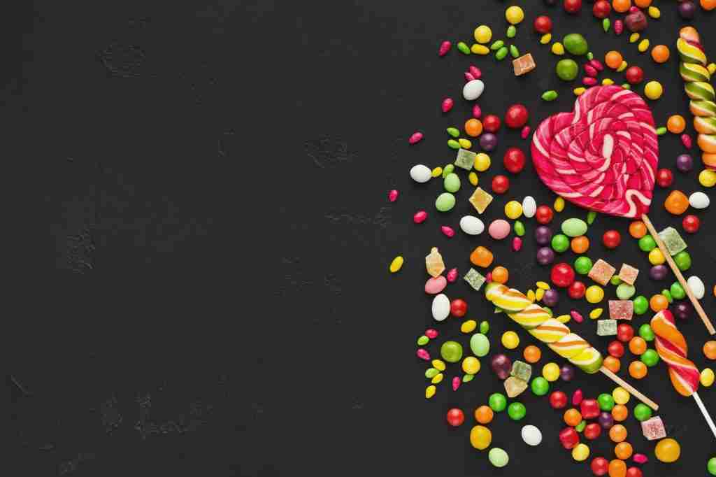 Colorful candies and bonbons background for sweet food gifts